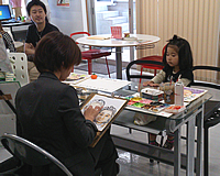 似顔絵をお描きした兄妹