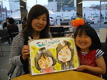 似顔絵をお描きした親子