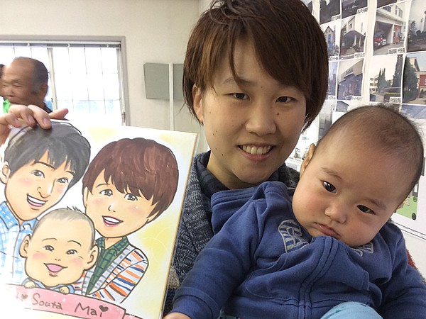 似顔絵をお描きした親子連れ