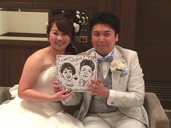 似顔絵をお描きした新郎新婦様
