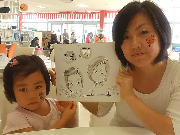 似顔絵をお描きした親子