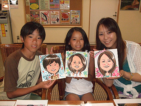 似顔絵をお描きした親子連れ