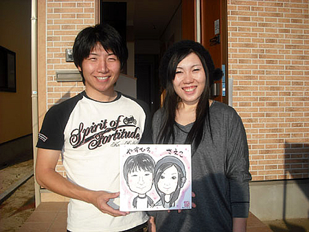 似顔絵をプレゼントしたご夫婦