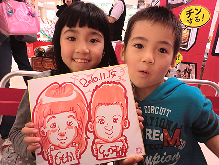 似顔絵をプレゼントした兄妹