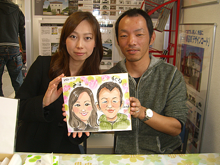 似顔絵をプレゼントしたご夫婦