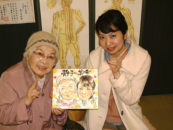 似顔絵をお描きしたおばあさんとお孫さん