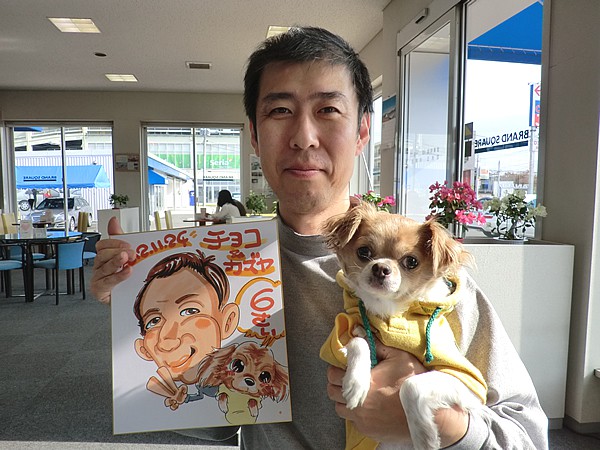 似顔絵をお描きしたお客様とペット